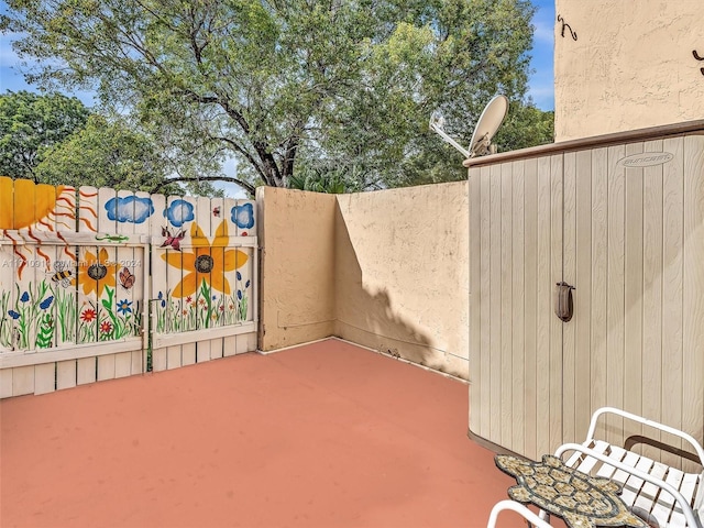 view of patio with fence