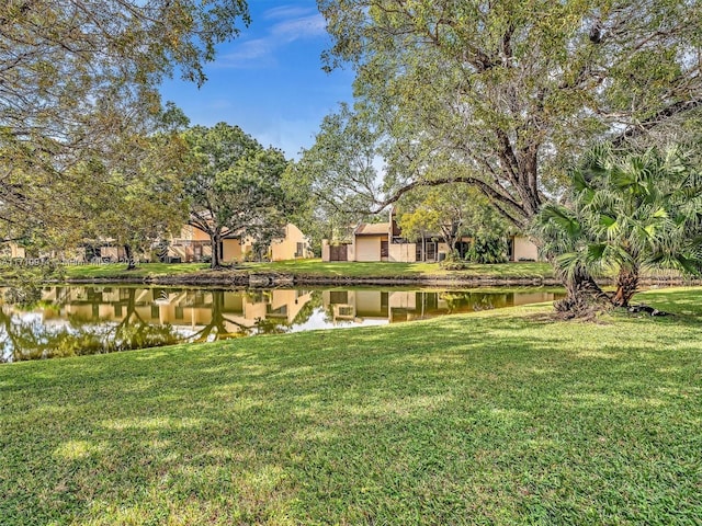 view of yard with a water view