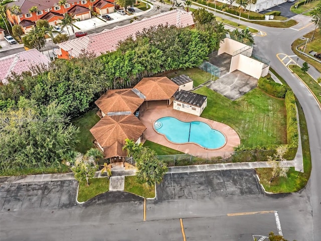 birds eye view of property with a residential view