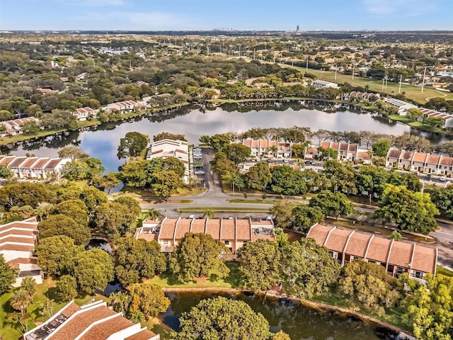 birds eye view of property featuring a residential view and a water view