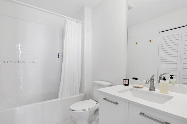 full bathroom featuring vanity, toilet, and shower / bath combo with shower curtain