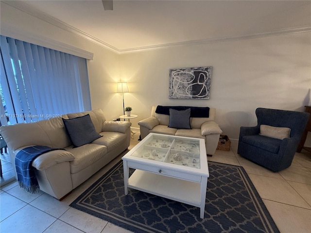 living room featuring crown molding and light tile patterned flooring