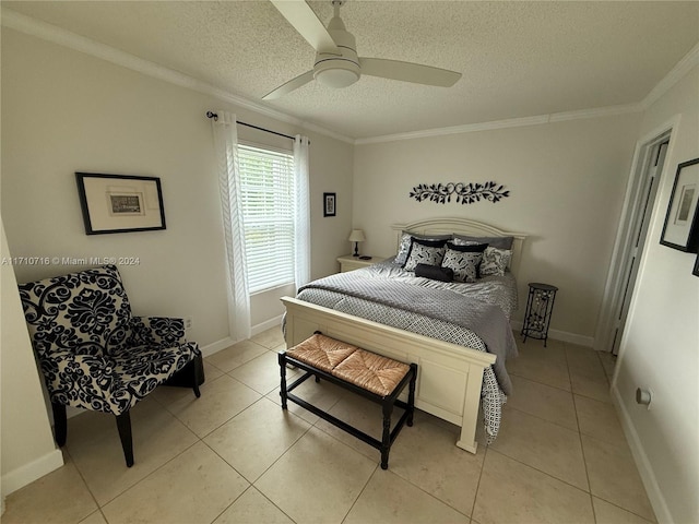 tiled bedroom featuring a textured ceiling, ceiling fan, and crown molding