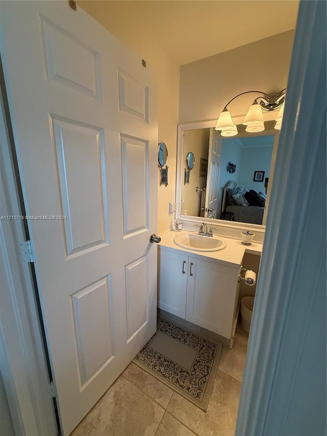 bathroom featuring tile patterned floors and vanity