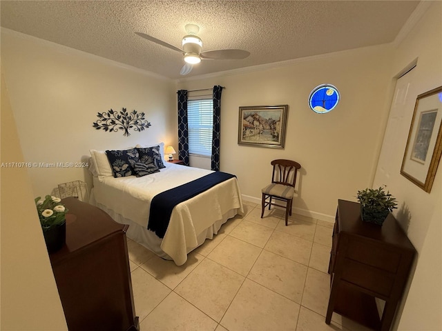 tiled bedroom featuring a textured ceiling, ceiling fan, and ornamental molding