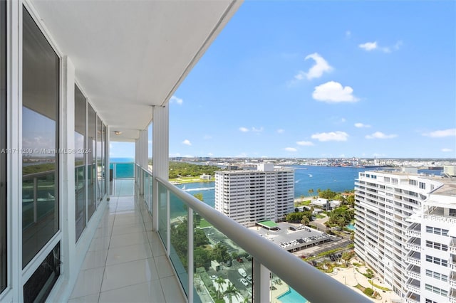 balcony featuring a water view