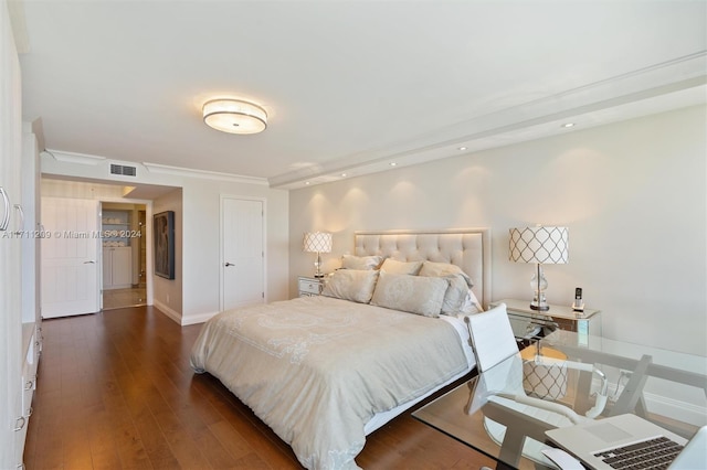 bedroom with dark wood-type flooring