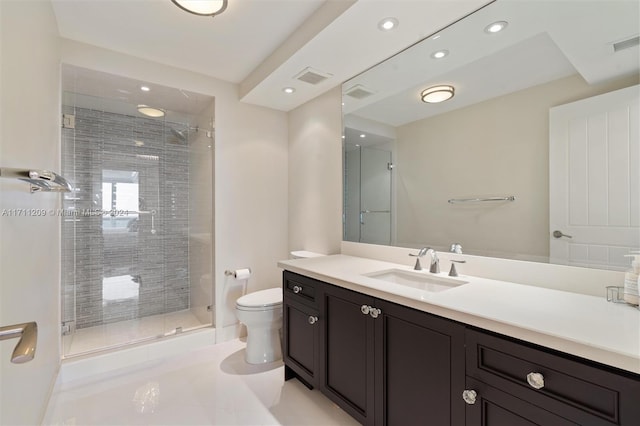 bathroom with walk in shower, tile patterned flooring, vanity, and toilet