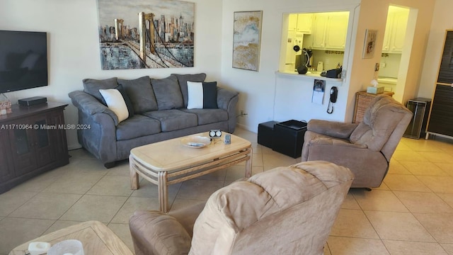 living room with light tile patterned floors