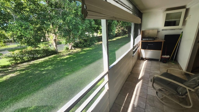 sunroom featuring a healthy amount of sunlight