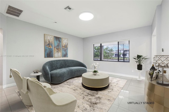 living room featuring light tile patterned floors