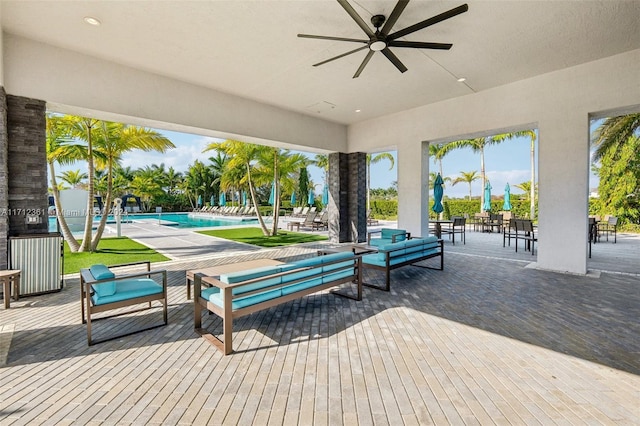 view of property's community featuring a patio and a pool