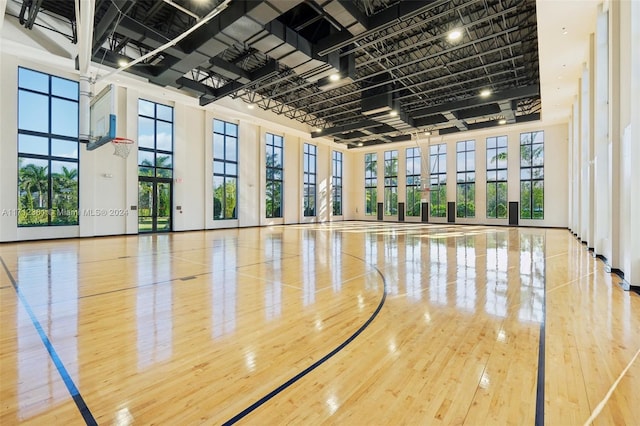 view of basketball court featuring plenty of natural light