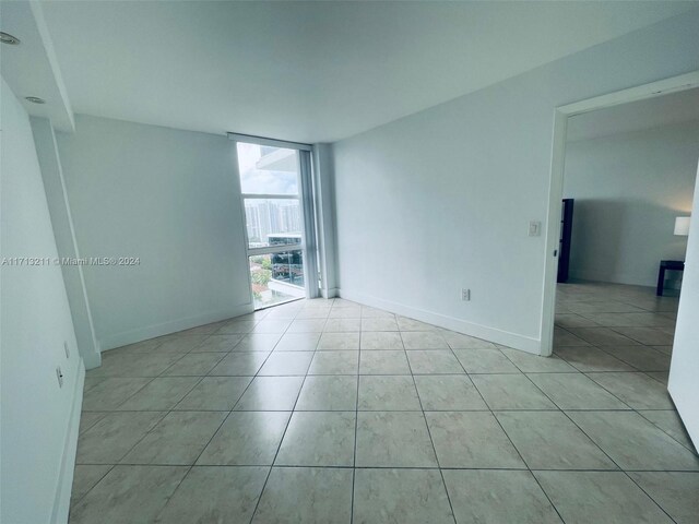 view of tiled spare room