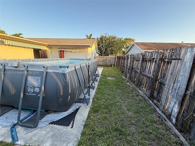view of yard featuring a fenced backyard