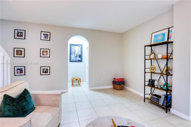 sitting room featuring light tile patterned floors