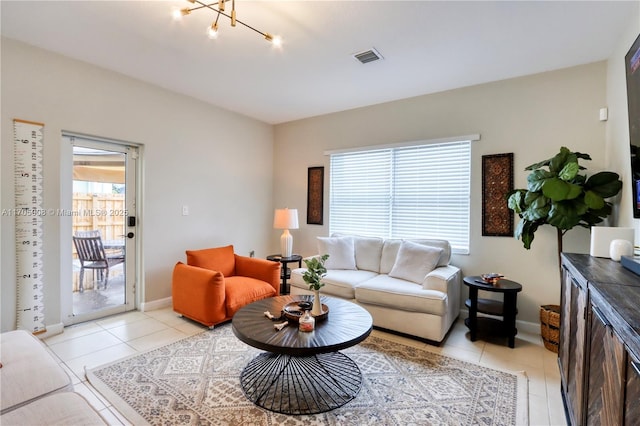 living room with light tile patterned flooring