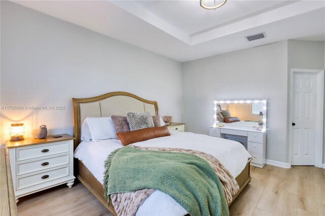 bedroom with light hardwood / wood-style flooring