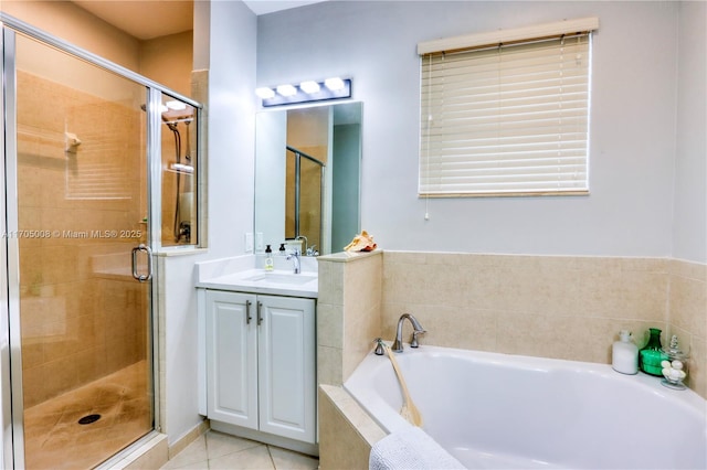 bathroom featuring tile patterned floors, vanity, and plus walk in shower