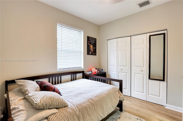 bedroom with light hardwood / wood-style flooring