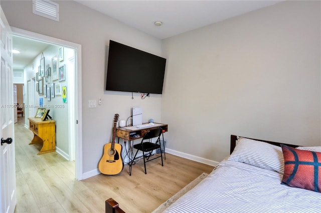 bedroom featuring light hardwood / wood-style flooring