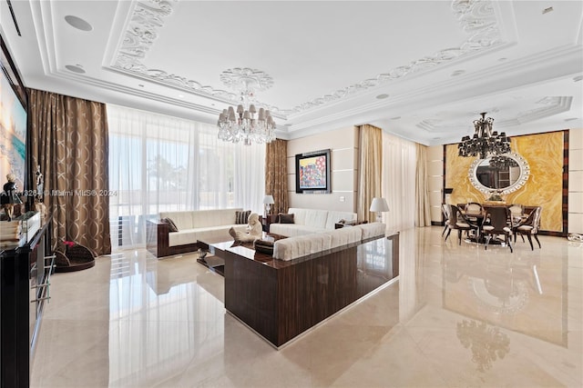 living room with a raised ceiling, ornamental molding, and an inviting chandelier