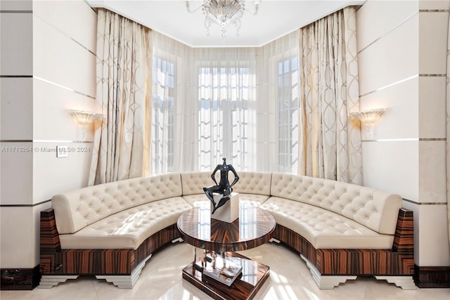 living room featuring a notable chandelier