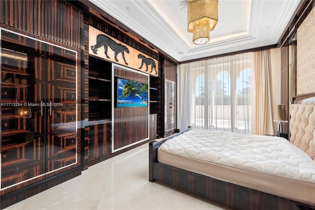 bedroom with a tray ceiling