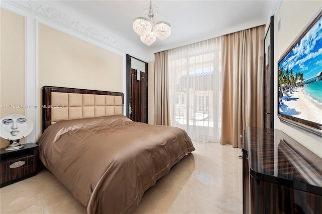 bedroom featuring an inviting chandelier