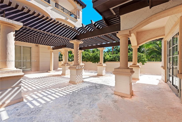 view of patio featuring a pergola