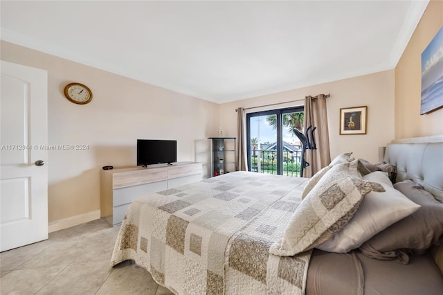 tiled bedroom featuring access to exterior and ornamental molding