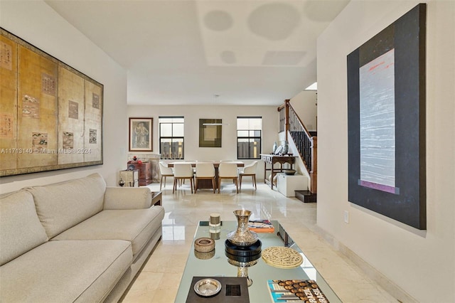 living room featuring light tile patterned floors