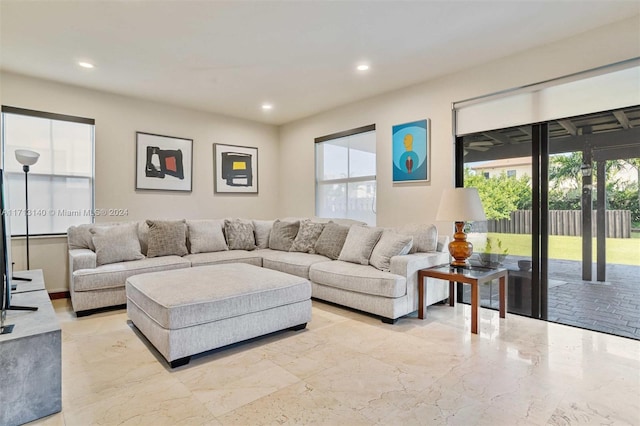 living room featuring plenty of natural light