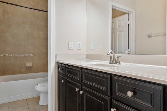 full bathroom with tile patterned flooring, shower / tub combo, vanity, and toilet