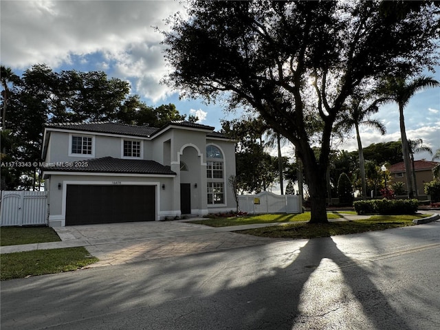 view of front of property with a garage