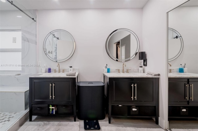 bathroom with vanity and walk in shower