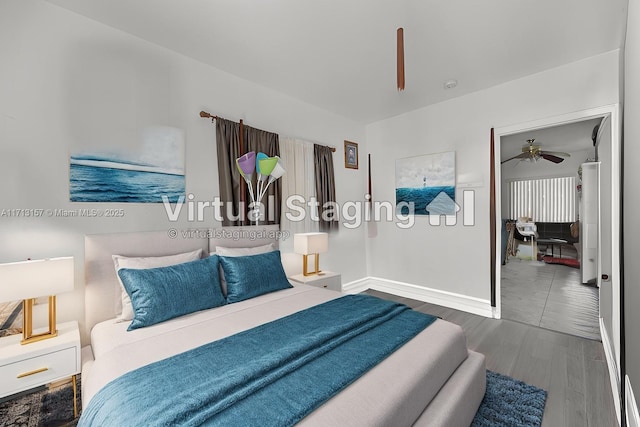 8315 NW 5th Ave Unit 8315, Miami, FL 33150 - bedroom featuring baseboards and wood finished floors