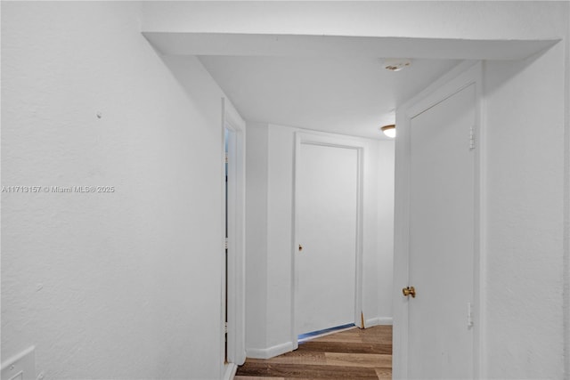 8315 NW 5th Ave Unit 8315, Miami, FL 33150 - hall with baseboards and dark wood-type flooring