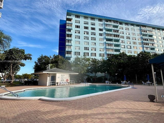 view of swimming pool featuring a patio