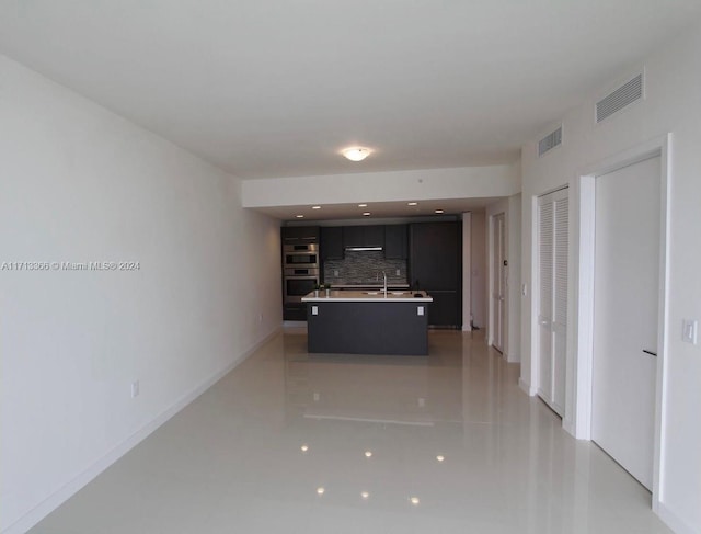 7875 NW 107th Ave Unit 719, Doral, FL 33178 - corridor with baseboards and a sink