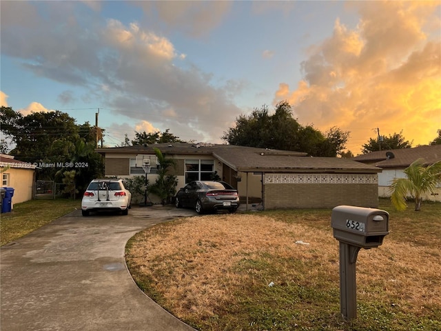 view of front of house with a yard