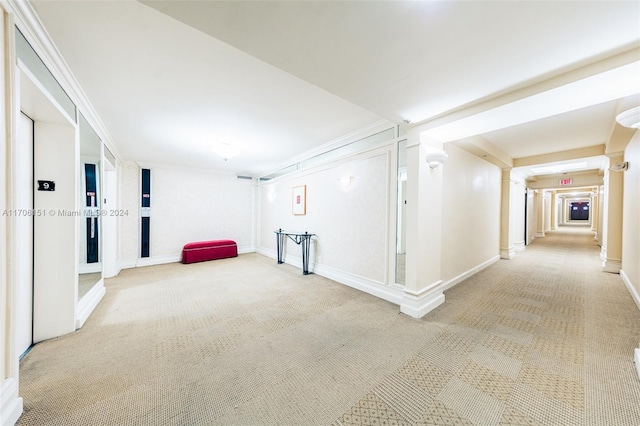 hallway with carpet floors