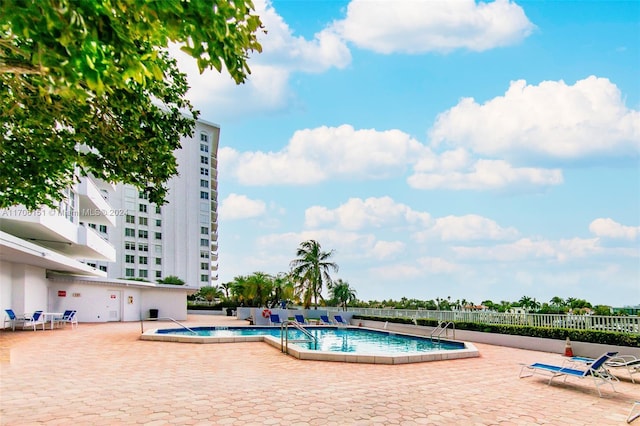 view of pool featuring a patio area