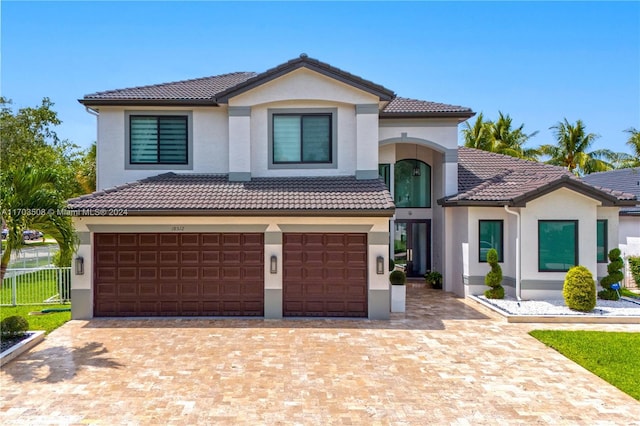 view of front of property with a garage