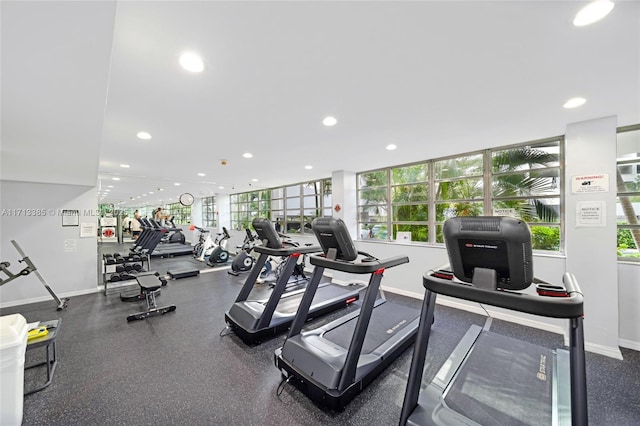 exercise room featuring recessed lighting and baseboards