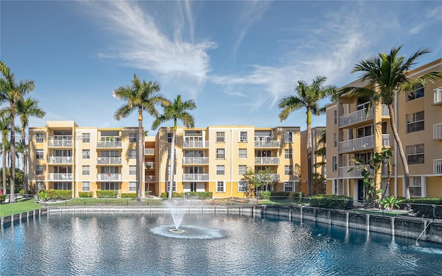 view of pool featuring a water view