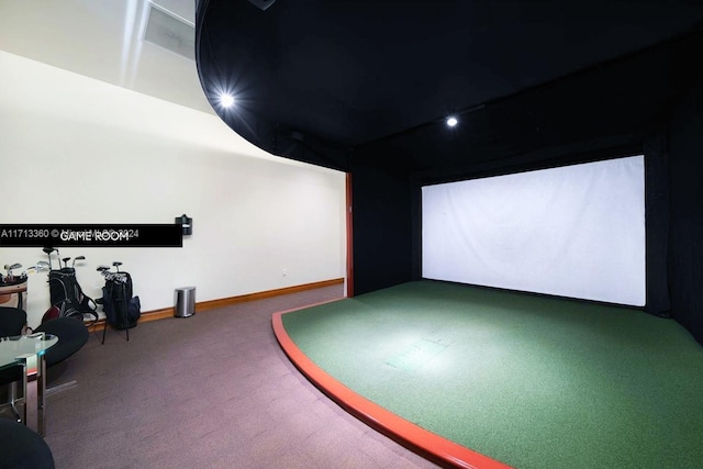 playroom with carpet floors and golf simulator