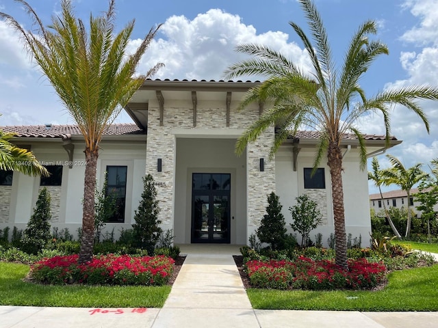 view of exterior entry with french doors