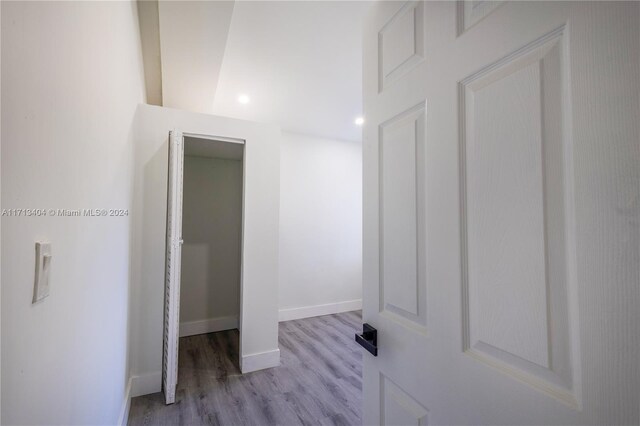 hallway featuring light wood-type flooring