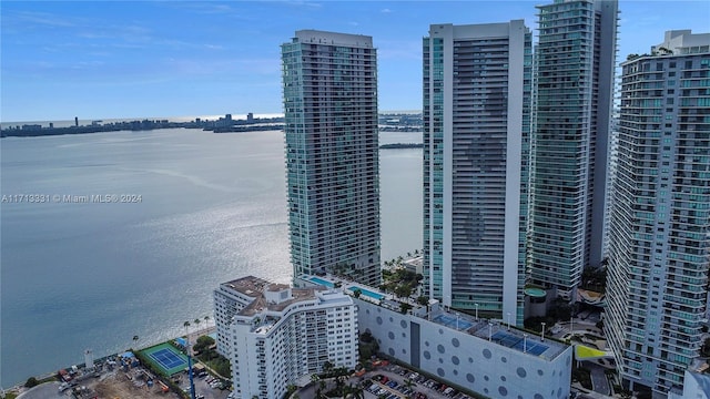 birds eye view of property featuring a water view